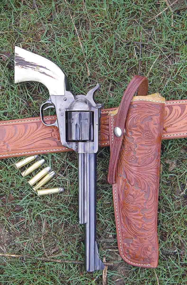 This Colt New Frontier SAA .357 Magnum is carried in open country when shots at coyotes and other varmints are often long. The beautiful carved holster rig is a Model 1920 Threepersons by El Paso Saddlery.